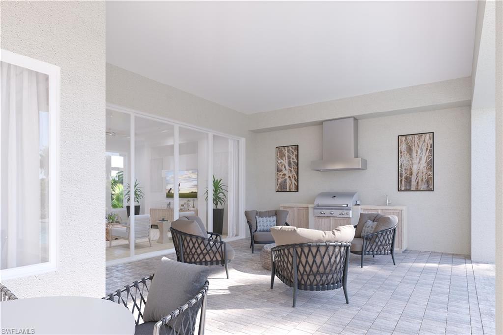 16745 Cabreo Drive Naples, FL 34110 - Photo 7 of 29 a living room with furniture and a potted plant