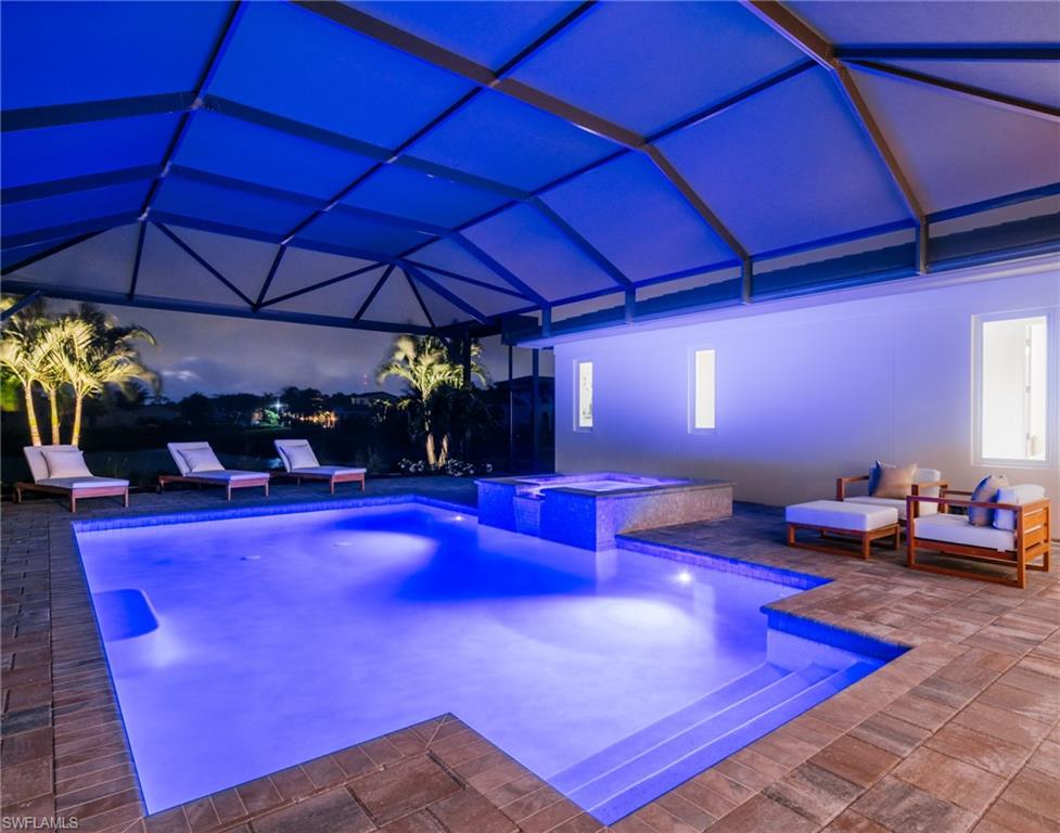 16745 Cabreo Drive Naples, FL 34110 - Photo 8 of 29 a view of a tables and chairs in the patio