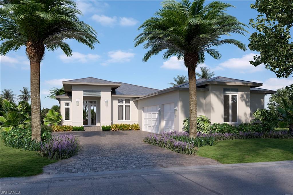 16745 Cabreo Drive Naples, FL 34110 - Photo 9 of 29 a front view of house with yard and green space