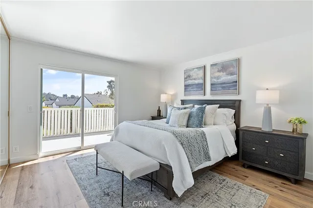 a bed room with a bed and a window