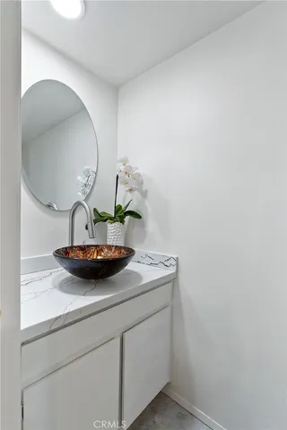 a view of a sink and a mirror