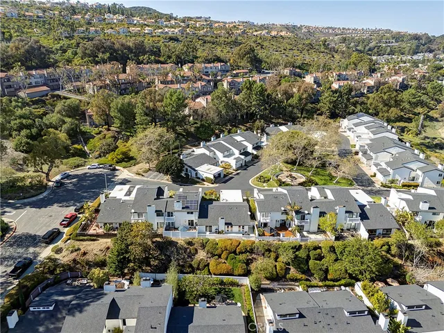 an aerial view of a city with lots of residential buildings