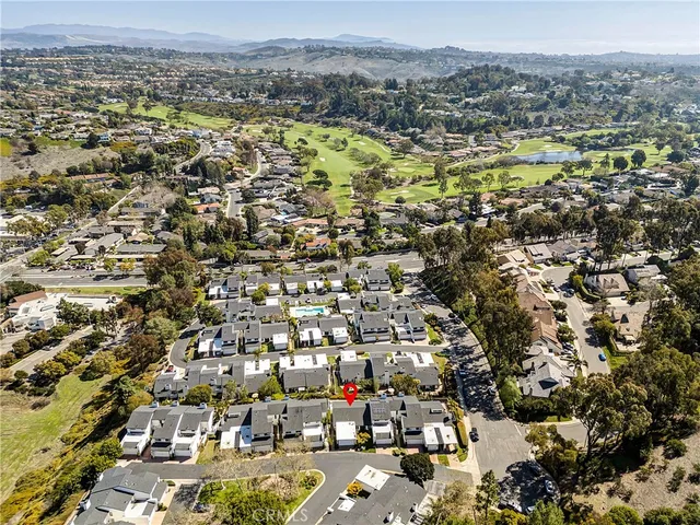 an aerial view of residential house and parking space
