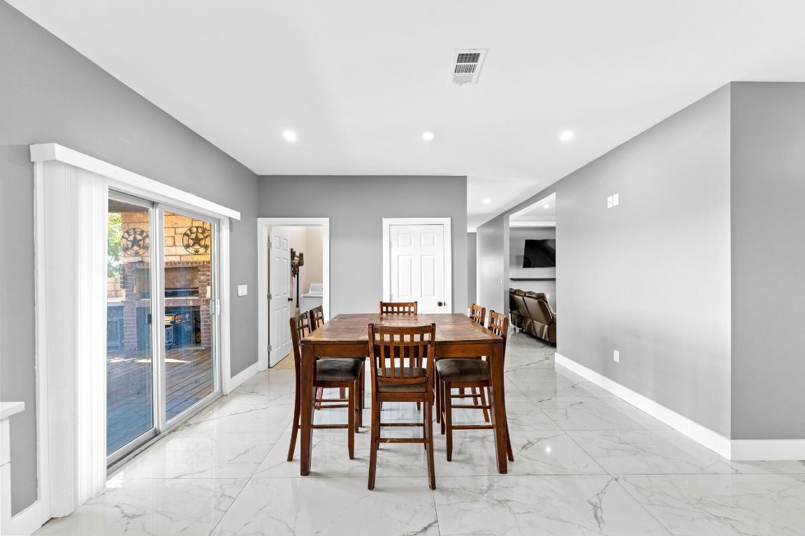 749 El Rey Drive Kyle, TX 78640 - Photo 13 of 40 a view of a dining room with furniture
