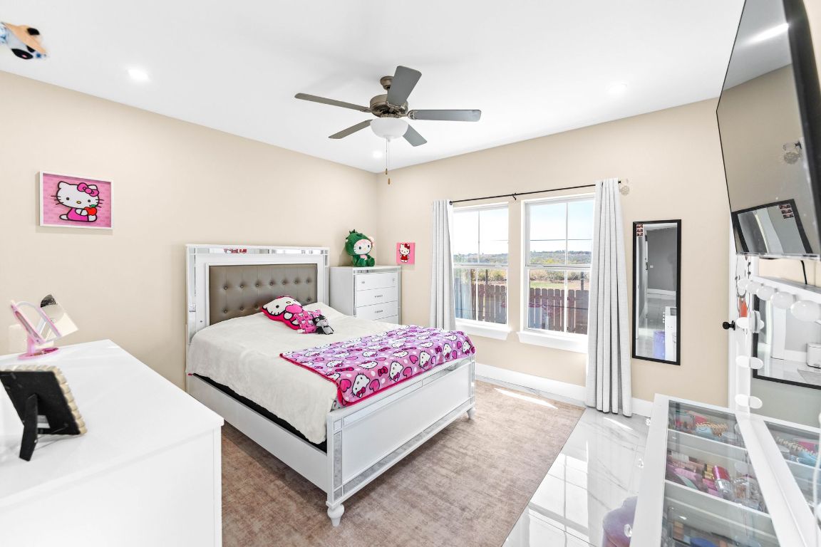 749 El Rey Drive Kyle, TX 78640 - Photo 23 of 40 a living room with furniture and a table