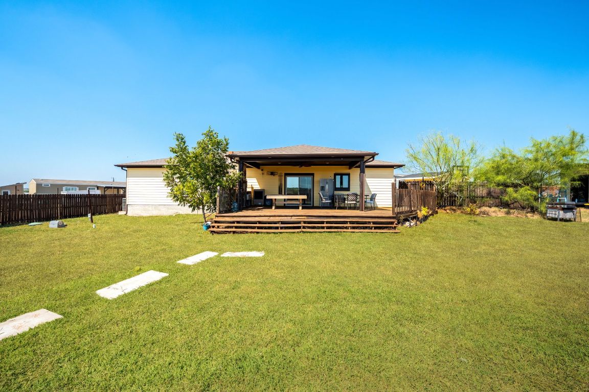 749 El Rey Drive Kyle, TX 78640 - Photo 36 of 40 a house view with swimming pool in front of it