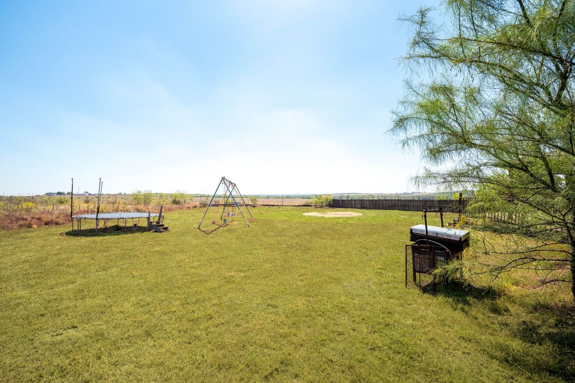 749 El Rey Drive Kyle, TX 78640 - Photo 38 of 40 a view of a lake with a outdoor space