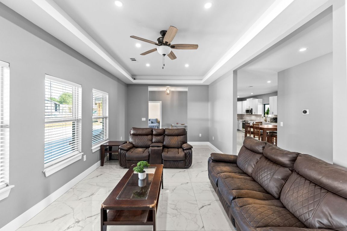 749 El Rey Drive Kyle, TX 78640 - Photo 10 of 40 a living room with furniture and a large window