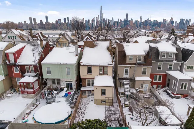 a view of a house with outdoor space and sitting space