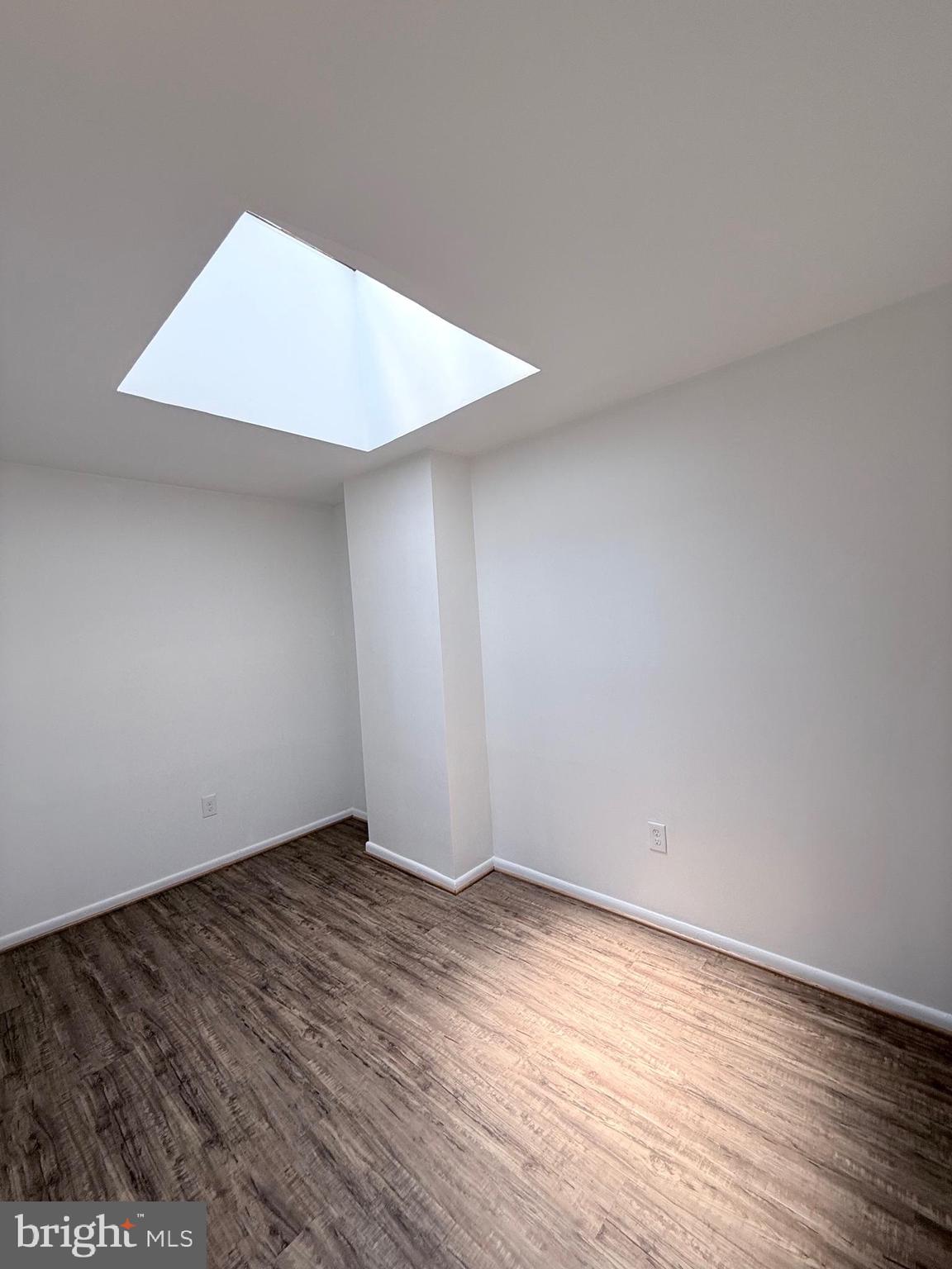 1820 West Fayette Street, Unit 2 Baltimore, MD 21223 - Photo 17 of 26 wooden floor in a room