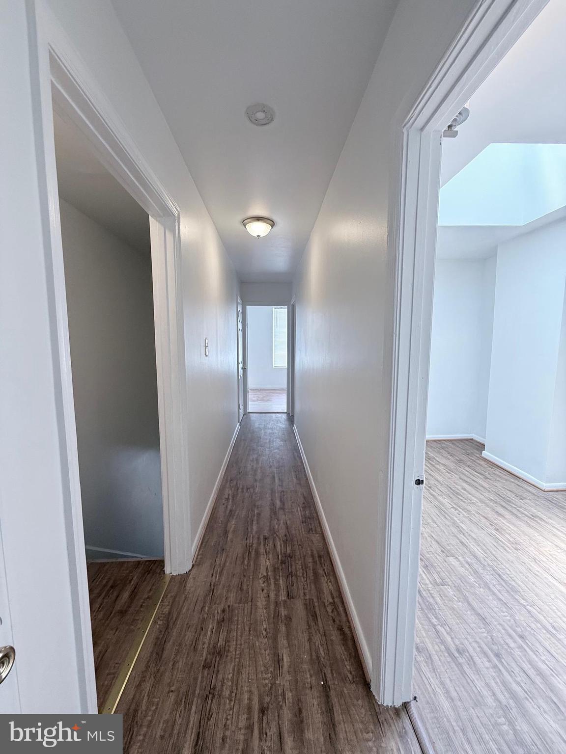1820 West Fayette Street, Unit 2 Baltimore, MD 21223 - Photo 24 of 26 a view of hallway with wooden floor