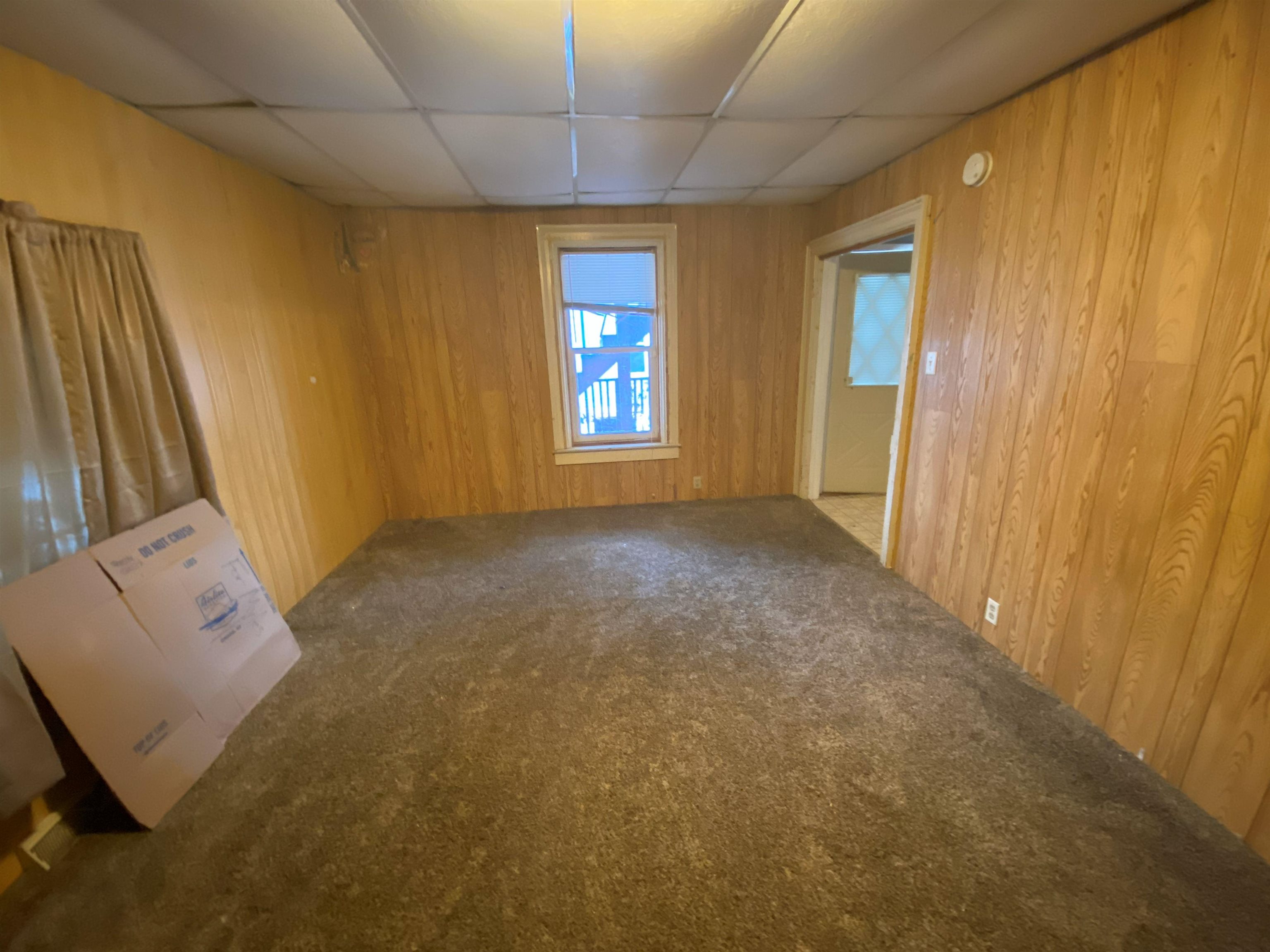 609 West Pleasant Street Freeport, IL 61032 - Photo 9 of 17 a view of an empty room and window