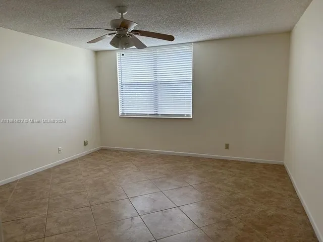 a bathroom with a sink a toilet and bathtub