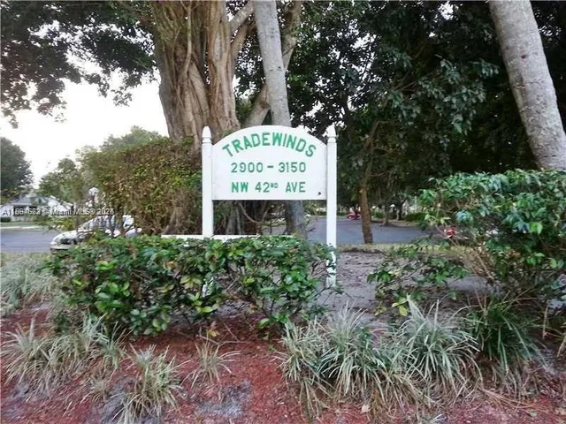 a sign on the side of the road