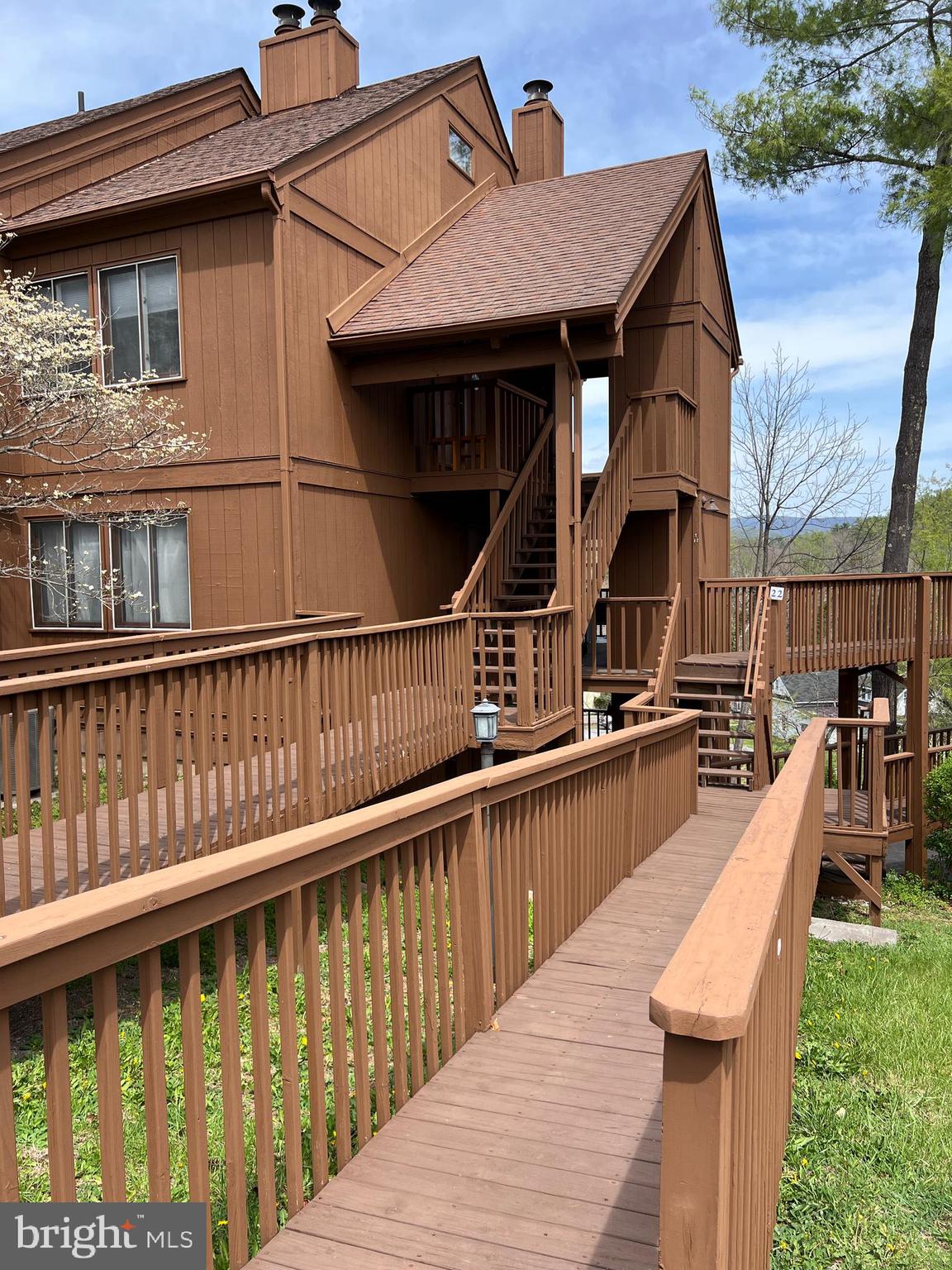 a view of a balcony with chairs