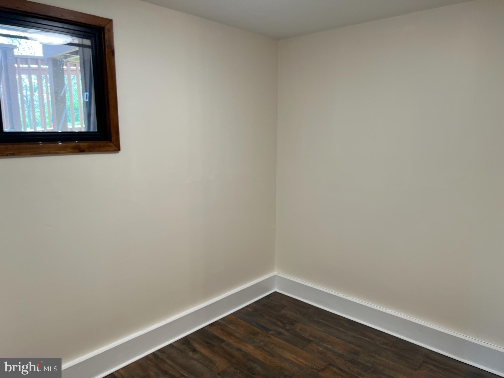 140 The Hill Road, Unit 21B Basye, VA 22810 - Photo 12 of 17 a view of a small space with wooden floor and a window