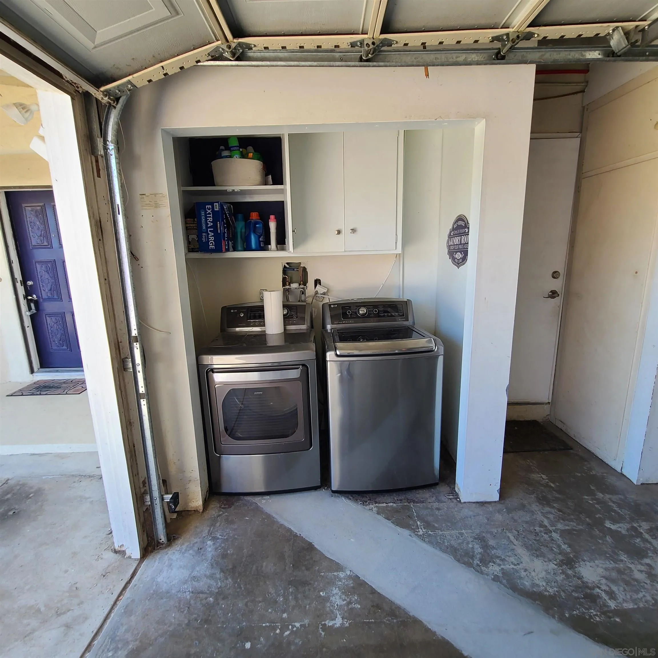 12731 Rios Road San Diego, CA 92128 - Photo 17 of 46 a utility room with dryer and washer