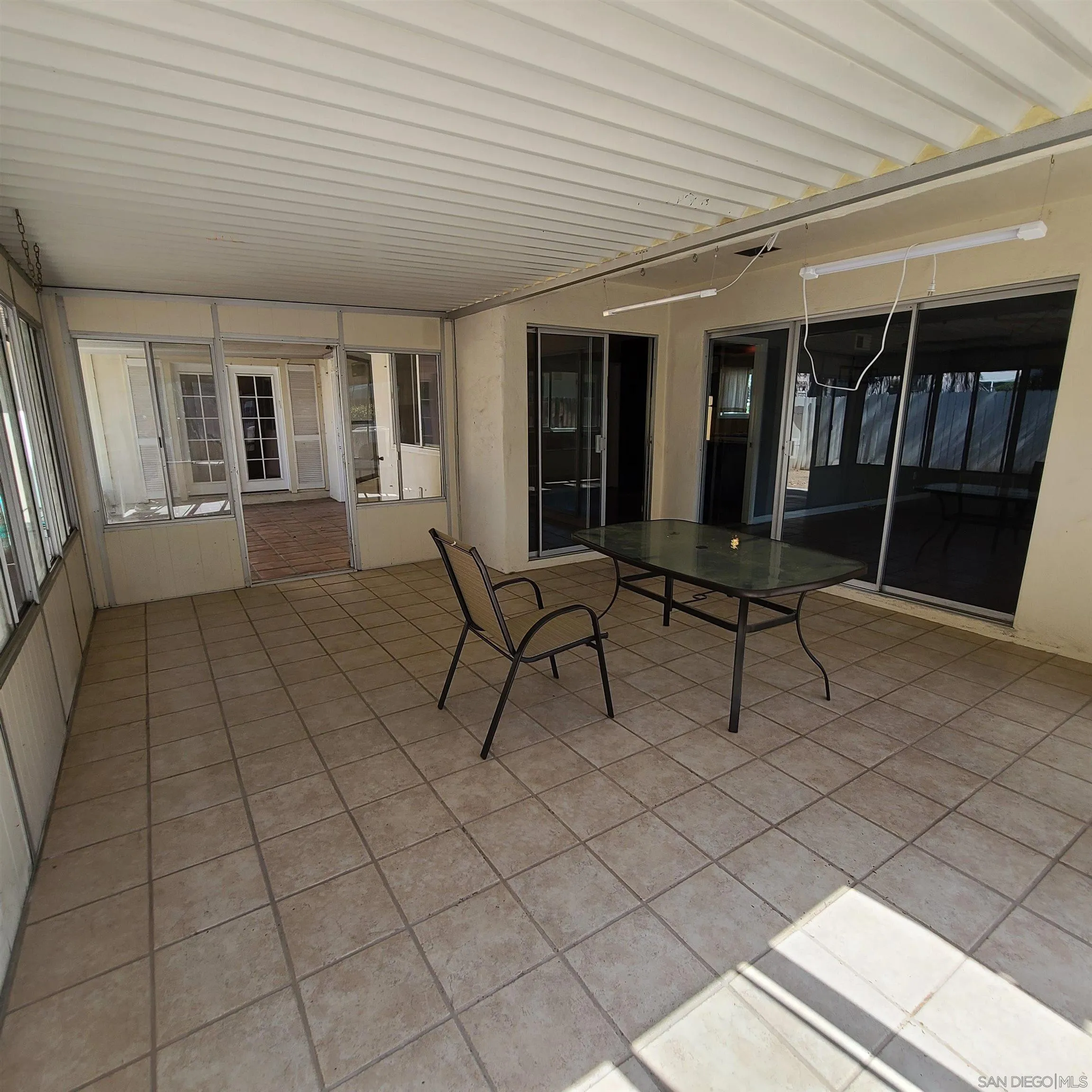 12731 Rios Road San Diego, CA 92128 - Photo 25 of 46 a view of a house with backyard and sitting area