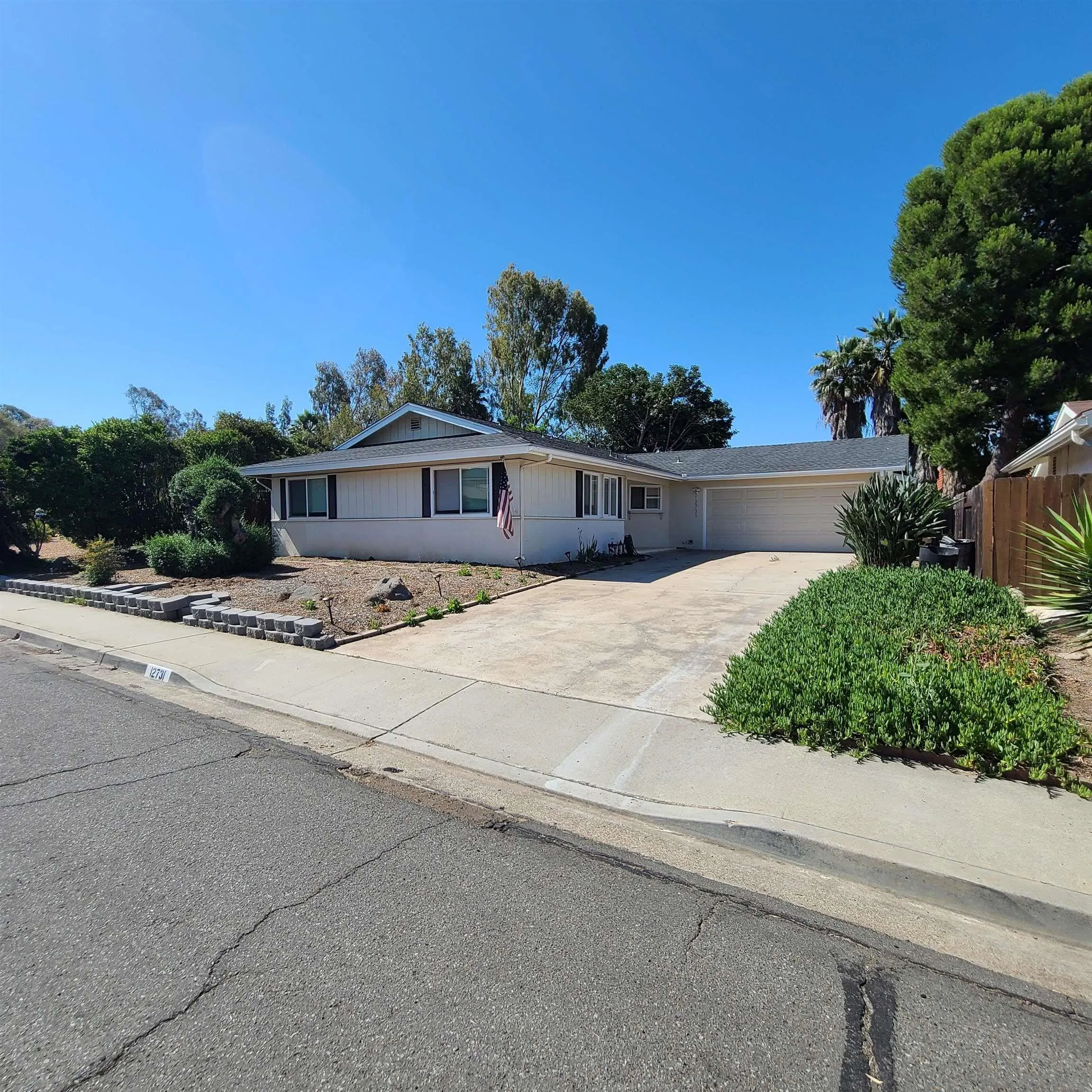 12731 Rios Road San Diego, CA 92128 - Photo 4 of 46 a view of a house with a outdoor space