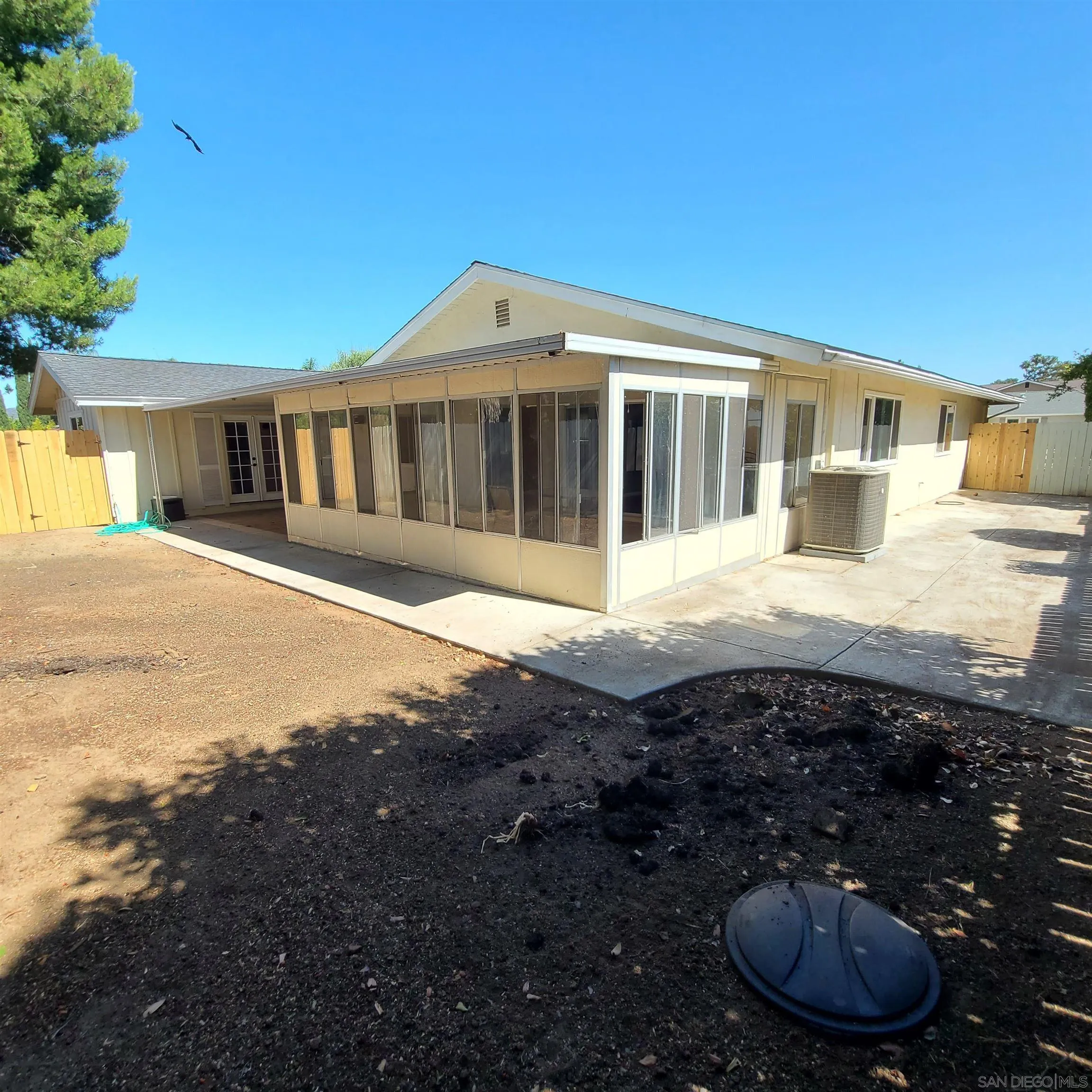 12731 Rios Road San Diego, CA 92128 - Photo 44 of 46 a view of a house with a yard