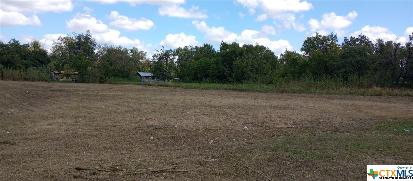 810 West 7th Street Cameron, TX 76520 - Photo 13 of 17 a view of outdoor space with trees all around