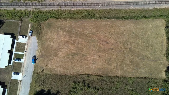 a view of residential houses with outdoor space