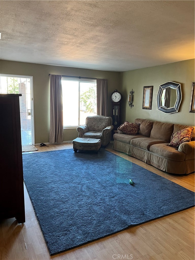 41870 B Street Murrieta, CA 92562 - Photo 6 of 16 a living room with furniture and a window