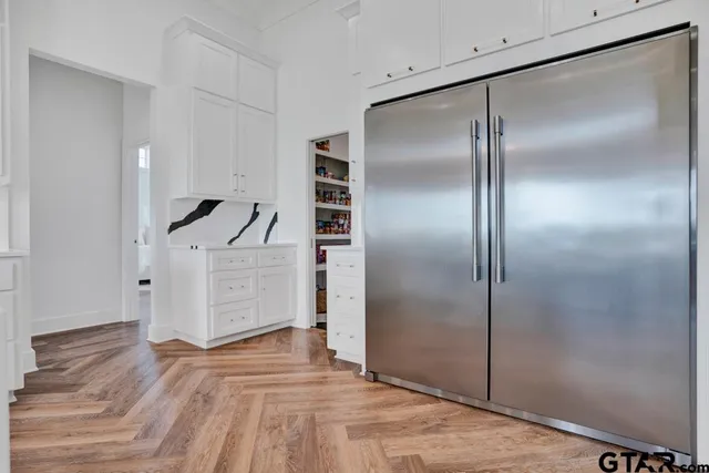 a room with toys and a book shelf