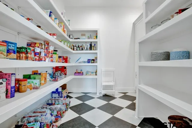 a room with lots of different kinds of food