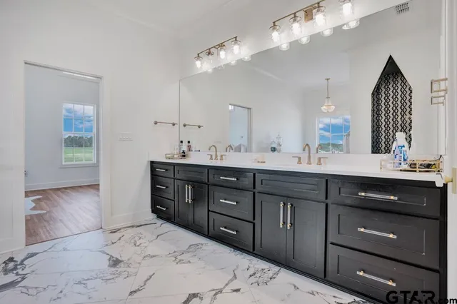 a bed room with a bed and a window