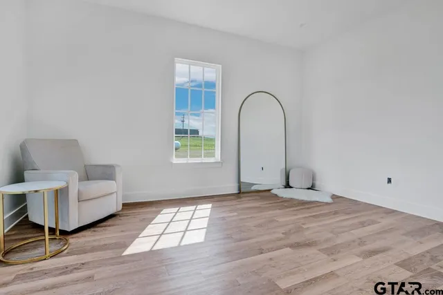a kitchen with a stove microwave and a sink