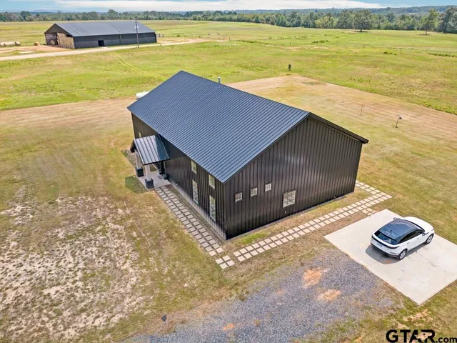 a view of a swimming pool with an ocean view