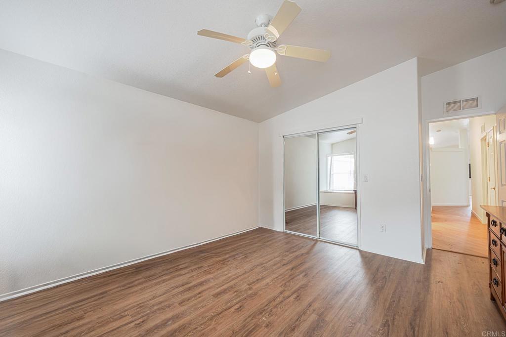 4650 Dulin Road, Unit 110 Fallbrook, CA 92003 - Photo 24 of 54 wooden floor in an empty room with a window