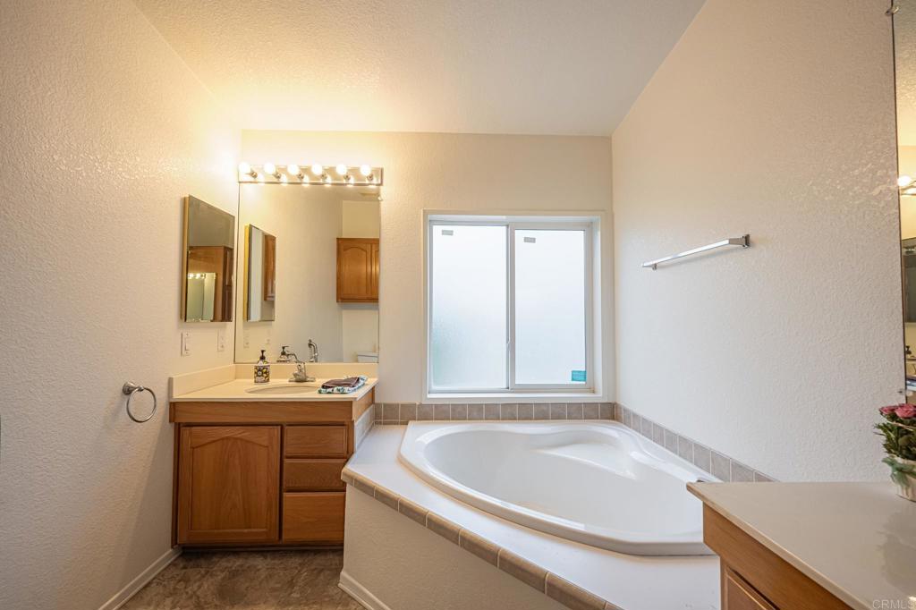 4650 Dulin Road, Unit 110 Fallbrook, CA 92003 - Photo 25 of 54 a bathroom with a sink and a bathtub