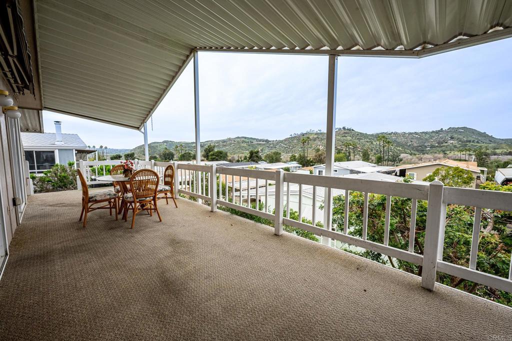 4650 Dulin Road, Unit 110 Fallbrook, CA 92003 - Photo 28 of 54 a view of a chairs and table in patio