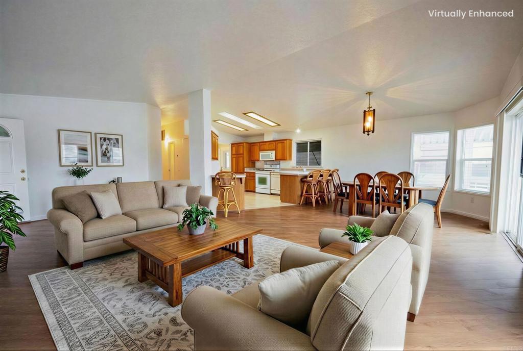 4650 Dulin Road, Unit 110 Fallbrook, CA 92003 - Photo 3 of 54 a living room with furniture and wooden floor