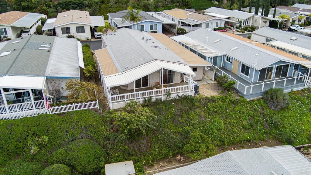4650 Dulin Road, Unit 110 Fallbrook, CA 92003 - Photo 32 of 54 a aerial view of a house with a yard