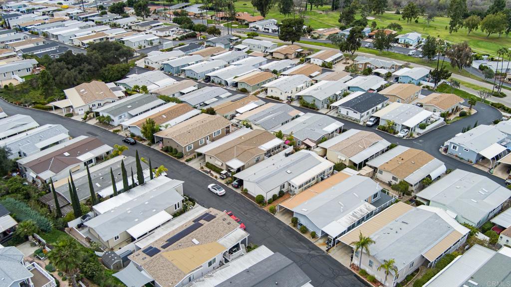4650 Dulin Road, Unit 110 Fallbrook, CA 92003 - Photo 36 of 54 an aerial view of a city with lots of residential buildings