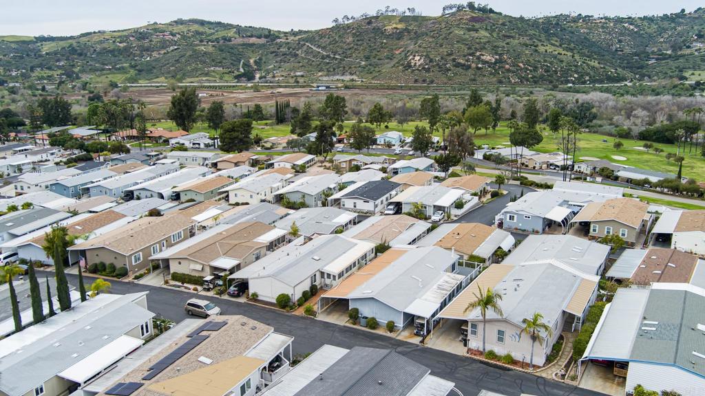 4650 Dulin Road, Unit 110 Fallbrook, CA 92003 - Photo 42 of 54 a view of a lake with a mountain view