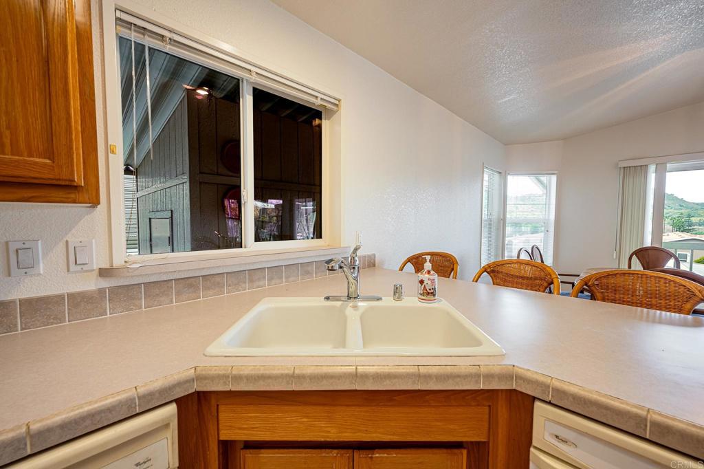 4650 Dulin Road, Unit 110 Fallbrook, CA 92003 - Photo 10 of 54 a kitchen with a sink and a window