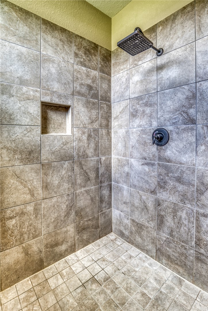 586 Ruby Drive Bellville, TX 77418 - Photo 20 of 50 a bathroom with a shower