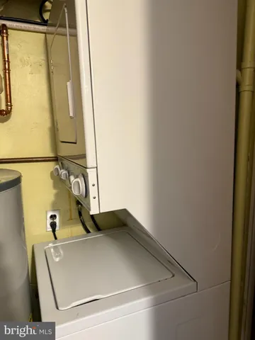 a close up of a sink and a mirror