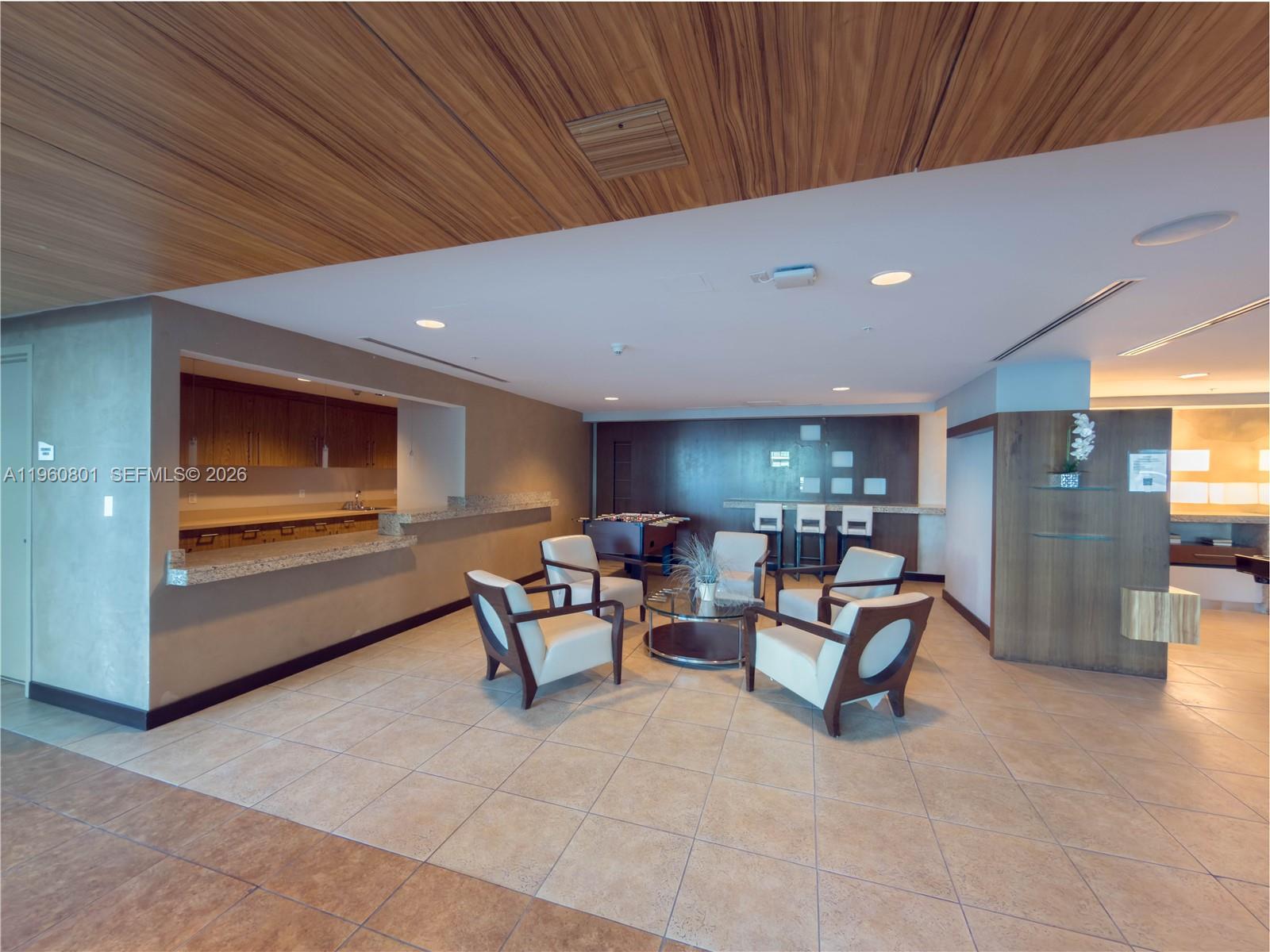 60 Southwest 13th Street, Unit 1605 Miami, FL 33130 - Photo 23 of 30 a living room with furniture