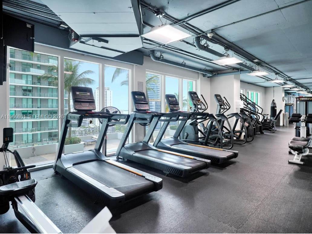 60 Southwest 13th Street, Unit 1605 Miami, FL 33130 - Photo 24 of 30 a view of a room with gym equipment