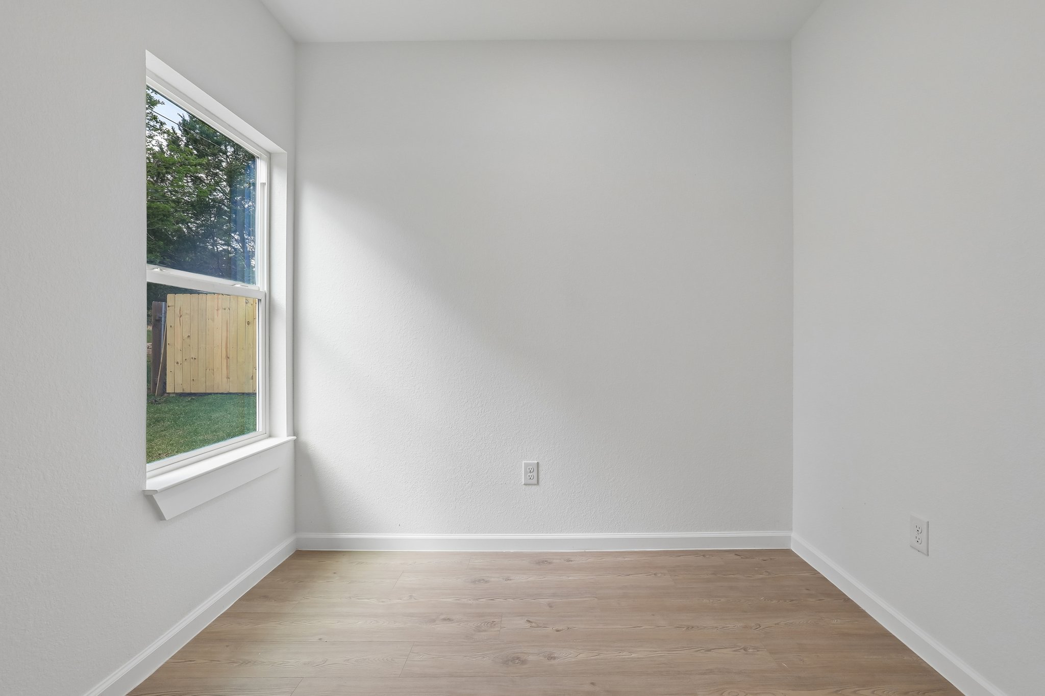 210 Flint Ridge Street Bastrop, TX 78602 - Photo 25 of 40 a view of an empty room with a window