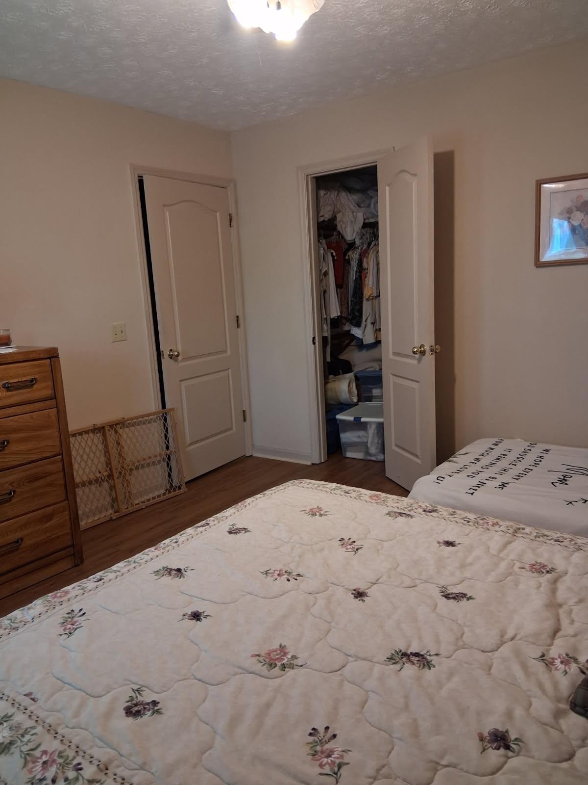 3168 Maxey Road Cedar Hill, TN 37032 - Photo 39 of 40 a bedroom with a bed and a dresser in it