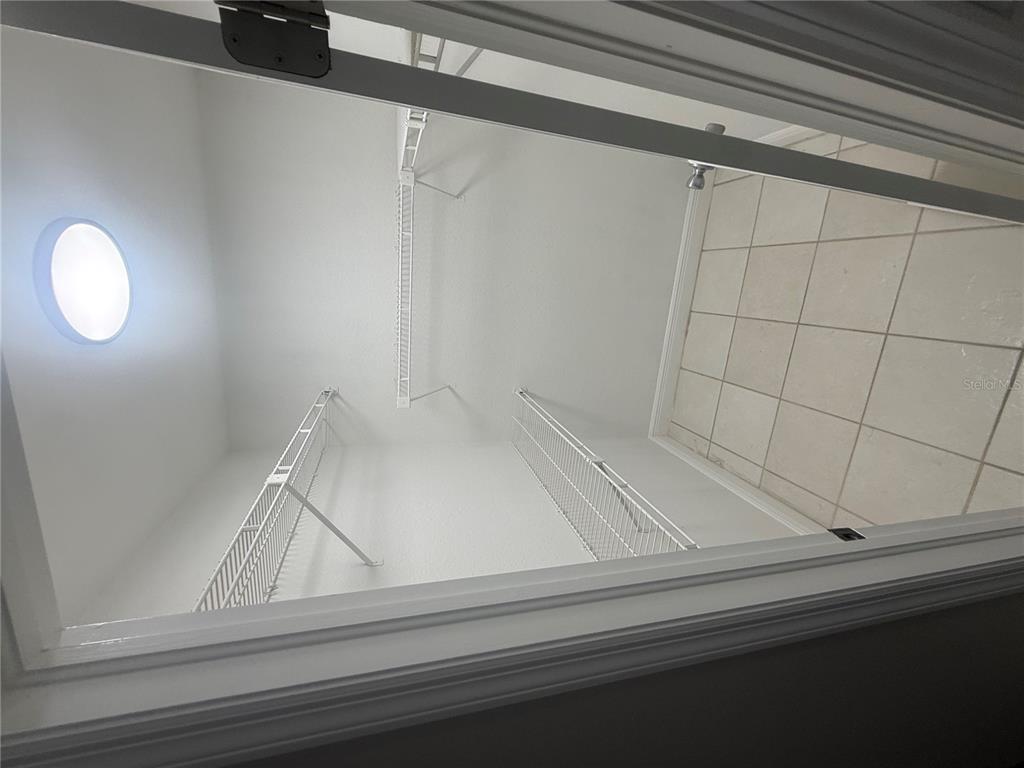 7350 Landmark Drive Spring Hill, FL 34606 - Photo 6 of 16 a view of wooden floor with a window