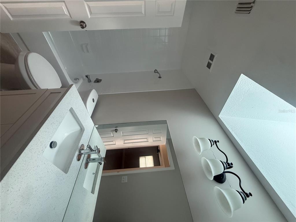 7350 Landmark Drive Spring Hill, FL 34606 - Photo 8 of 16 a utility room with dryer and washer