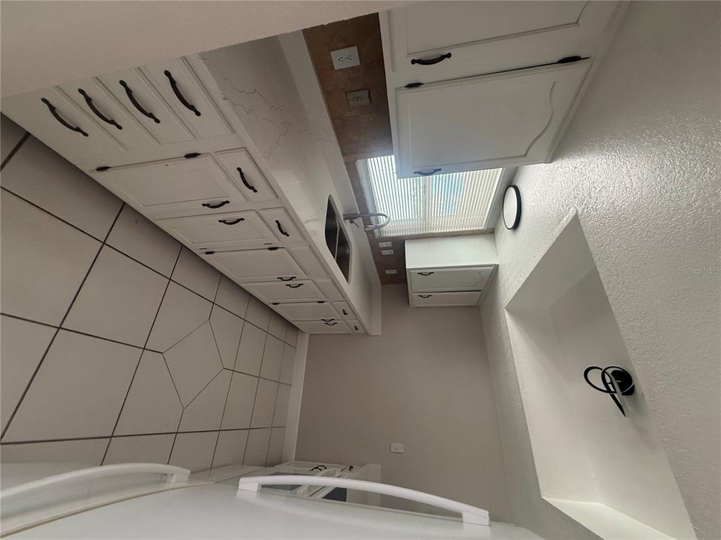 7350 Landmark Drive Spring Hill, FL 34606 - Photo 9 of 16 a view of walk in closet