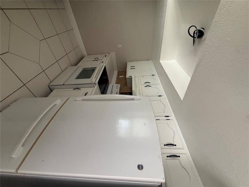 7350 Landmark Drive Spring Hill, FL 34606 - Photo 10 of 16 a bathroom with a sink